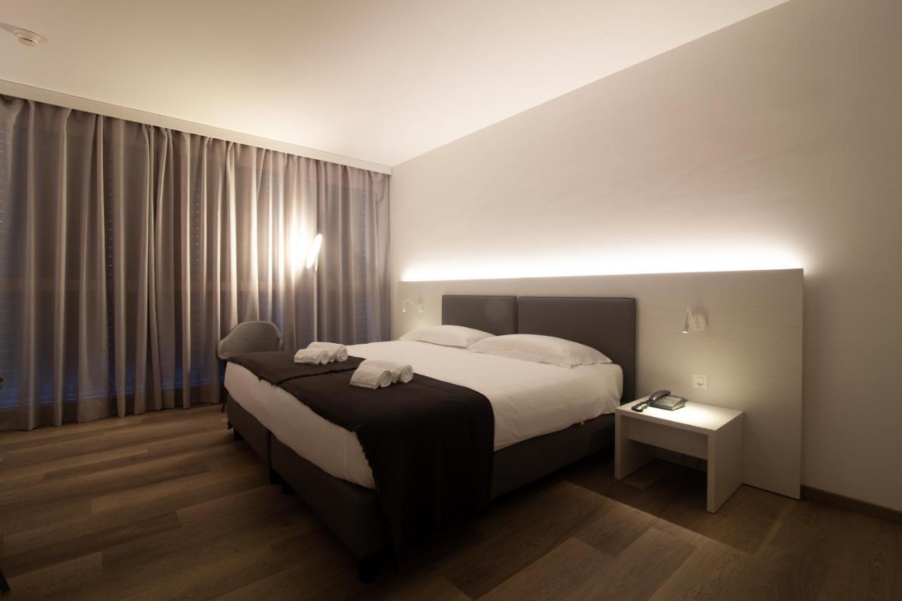 Hotel Albergo Milano เมนดริซิโอ ภายนอก รูปภาพ